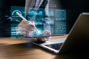 Data analyst use laptop to analyze charts business data on dashboard virtual screen, technology...