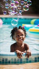 An African American girl leaning on the edge of a pool, joyfully watching colorful bubbles float in the air. Summer fun, childhood, play, and happiness concept