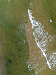 Sea waves of the Baltic sea, view from above, background