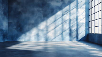 Fototapeta premium A blue-toned room with soft light and shadow play.