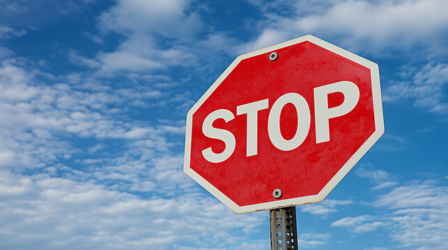 stop sign on blue sky