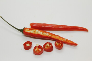 A group of red hot chili peppers and green hot chili peppers are ripe for bring to be a ingredient.