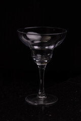 martini glass, empty glass, cocktail glass. 