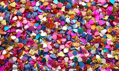 Rainbow shimmer, vibrant glitter particles dance in a spectrum of colors, creating a mesmerizing and enchanting visual experience.