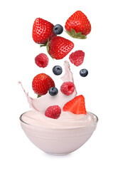 Fresh berries falling into bowl of yogurt on white background