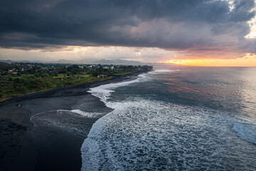 High angle view of black sand beach at sunrise in Bali, Indonesia