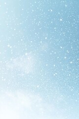 Fototapeta premium Sparkling snowflakes dance in a clear winter sky during a serene afternoon in a quiet landscape