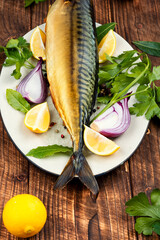 Hot-smoked headless mackerel.