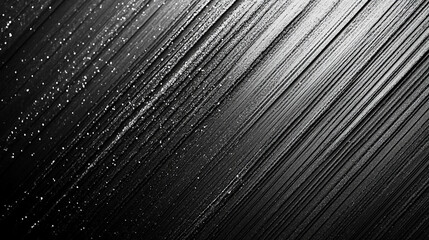 Obraz premium Intricate patterns of light and shadow created by water droplets on a textured surface