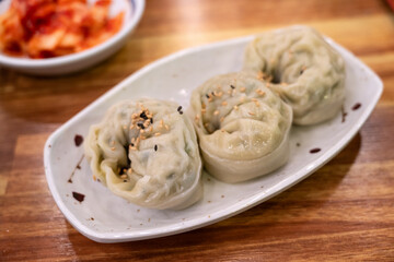 Delicious steamed dumplings in South Korean restaurant.