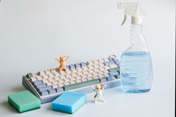 Cleaning the keycaps of a mechanical computer keyboard with cleaning products and special foam...