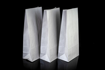 Set of paper bags for shopping on black background. Mockup for design