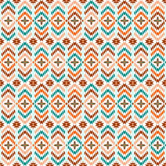 geometric ethnic Navajo pattern featuring diamond shapes symmetrical motifs in earthy tones of brown, green, on a light background.resembling embroidered fabric. Vector ethnic seamless pattern. Navajo