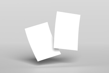 Top view of blank paper isolated on gray background. Poster mock-ups paper, white paper portrait A5.