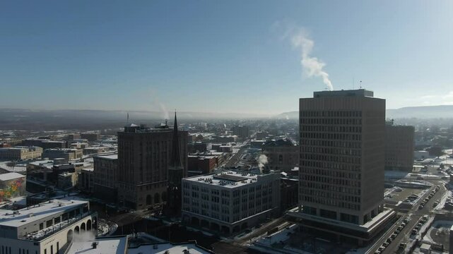 Downtown Utica, NY Aerial Drone on cold winter morning, rising above Genesee Street
