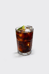 Fresh cuba libre cocktail with lemon and ice, stock, on white background