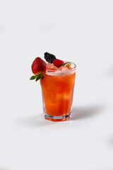 Fresh sex on the beach cocktail with fruit, strawberry, ice, sparkling bubbles, stock, on white background
