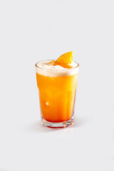 Fresh tequila sunrise cocktail with orange and ice sparkling bubbles, stock, on white background