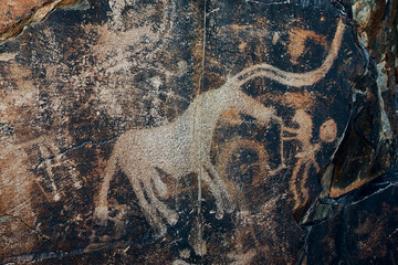 Petroglyphs in Tamgaly. Tamgaly is a petroglyph site in the Almaty region of Kazakhstan. Tamgaly became a UNESCO World Heritage Site in 2004. Tamgaly is located 170 km  northwest of Almaty.