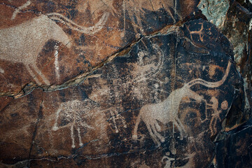 Petroglyphs in Tamgaly. Tamgaly is a petroglyph site in the Almaty region of Kazakhstan. Tamgaly became a UNESCO World Heritage Site in 2004. Tamgaly is located 170 km  northwest of Almaty.