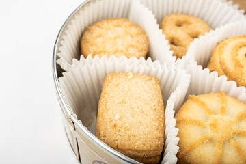 Danish shortbread cookies close-up in a tin box, Christmas cookies, cookies on a white background, isolate, catalog photo of cookies, holiday gift, pastries
