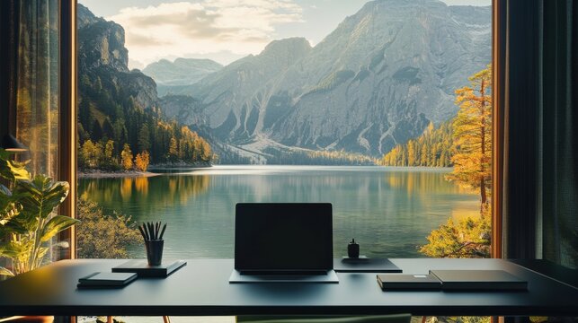 a laptop computer sitting on top of a desk