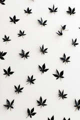 Naklejka premium White background with black leaves.