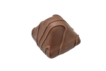 Chocolate candy with condensed milk filling lies on a PNG background.