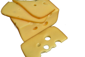 Hard cheese cut into slices lies on a PNG background.