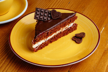 coffee in a cup and dessert on a plate
