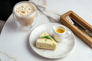 coffee in a cup and dessert on a plate