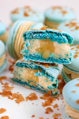 French blue macarons with blue vein cheese and pear cut in half 