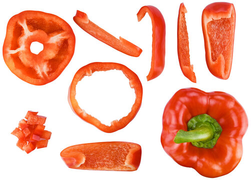 Set red bell pepper sweet and cut in half, into slices and cubes isolated on a transparent background. Completely in focus. Focus stacking. Top view.