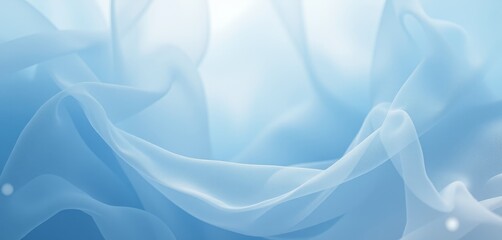 Fototapeta premium Light blue fabric folds in soft flowing texture.