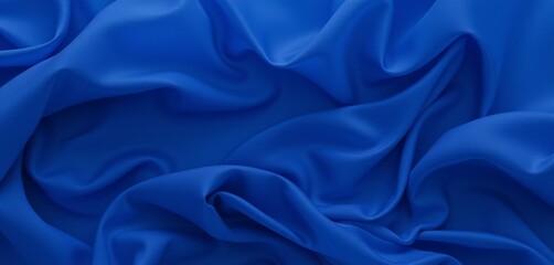 Obraz premium Royal blue fabric folds in rich flowing texture.