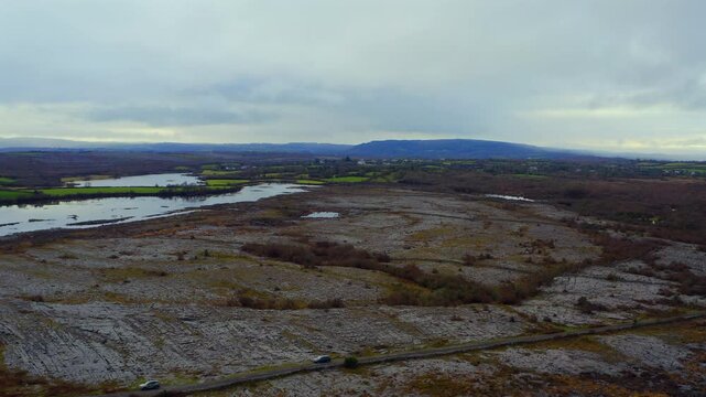 erial shot capturing the unique and rugged landscape of Burren National Park, County Clare, Ireland.