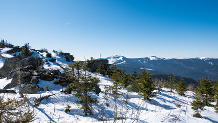 Beautiful breathtaking view to the Grosser Arber mountain from the winter wonderland of Sumava...