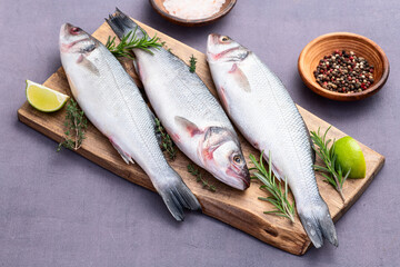 Raw sea bass fish photography . Top view