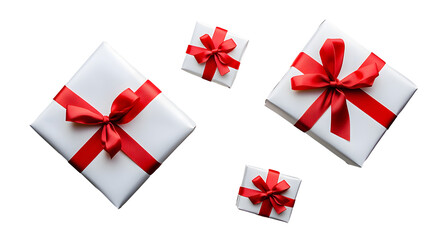 Top view of Christmas, birthday presents wrapped in white paper with red ribbon and bow decoration isolated against a transparent background.