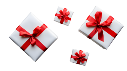 Top view of Christmas, birthday presents wrapped in white paper with red ribbon and bow decoration isolated against a transparent background.