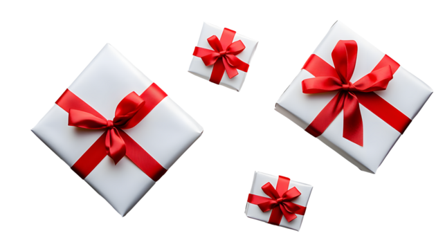 Top view of Christmas, birthday presents wrapped in white paper with red ribbon and bow decoration isolated against a transparent background.