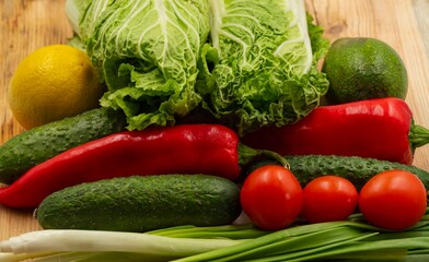 composition with fresh vegetables and fruits on wooden background