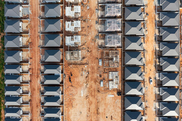 Aerial view of the residential site under construction. Building  houses. © Jitti
