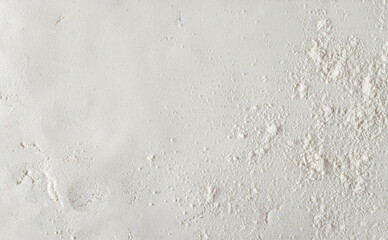 Organic coconut flour, texture and background, top view	
