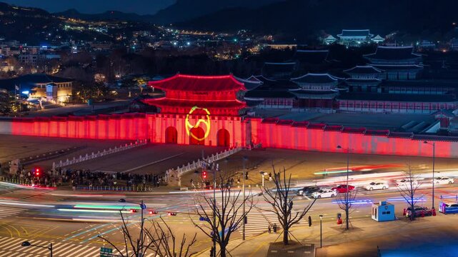 Gyeongbokgung Palace, Jongno-gu, Seoul, South Korea - December 29, 2024: Night view of Seoul Lantern Festival with laser show and light on the wall