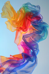 Obraz premium Vibrant Rainbow Scarf Flowing Gracefully in the Wind, Symbolizing Freedom, Pride, and Inclusivity Under a Bright Sky