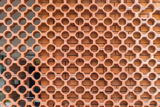 Latticed screen made with red clay hollow jali bricks