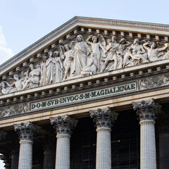 La Madeleine church south facade. Detail of the pediment sculpture The Last Judgement.