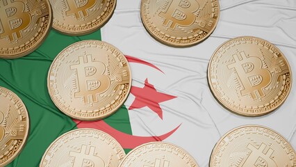 Several bitcoins are laid out on the flag of Algeria