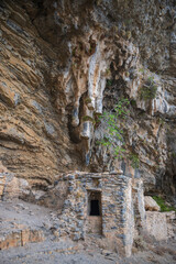 ruins of the ancient water cistern cave, part of afkule monastery in kayakoy fethiye turkey